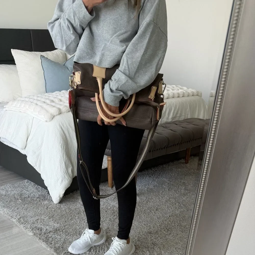 Grey Leather crossbody bag with Cream Handles and Red piping across the lining